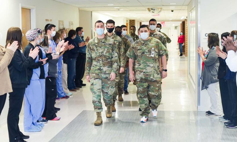 Bayhealth staff line the halls and cheer for Delaware National Guard service members during the thank-you celebration at Bayhealth Hospital’s Kent campus. SUBMITTED PHOTO